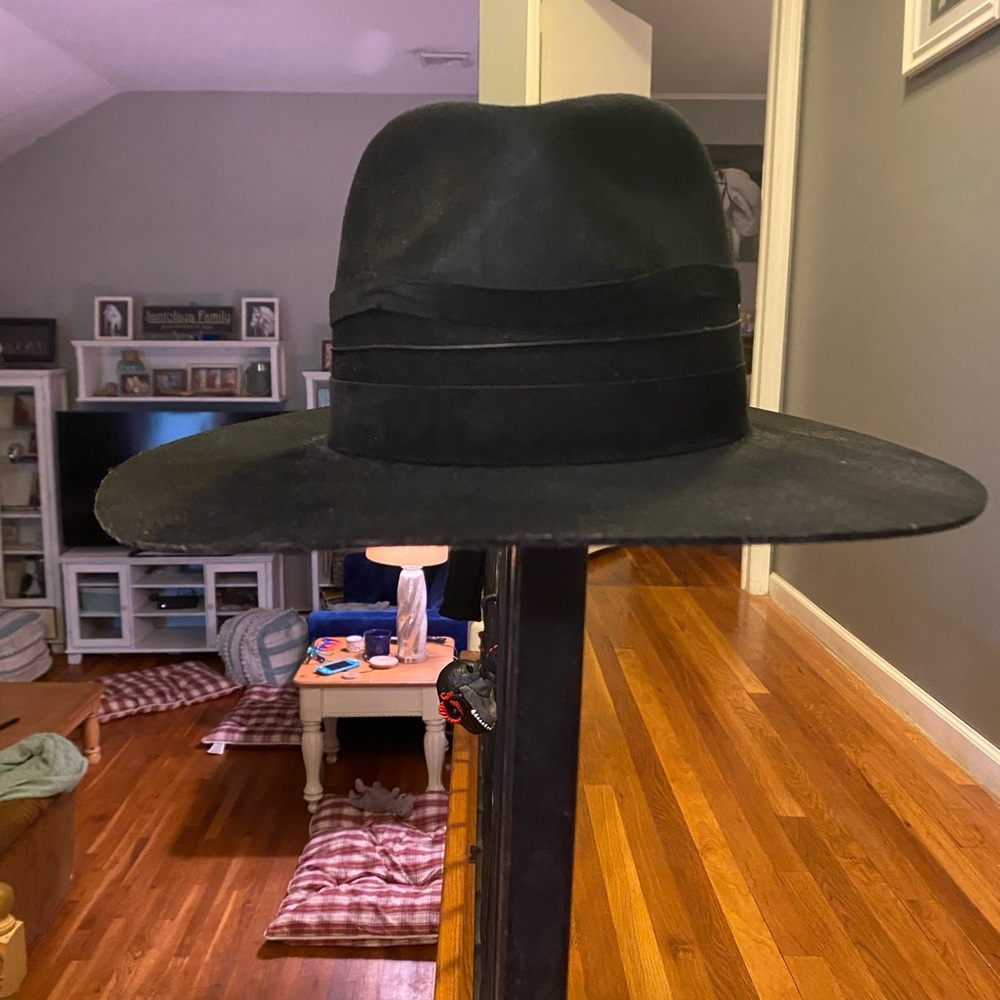 Janessa Leone. I don’t wear it enough anymore to justify keeping it.